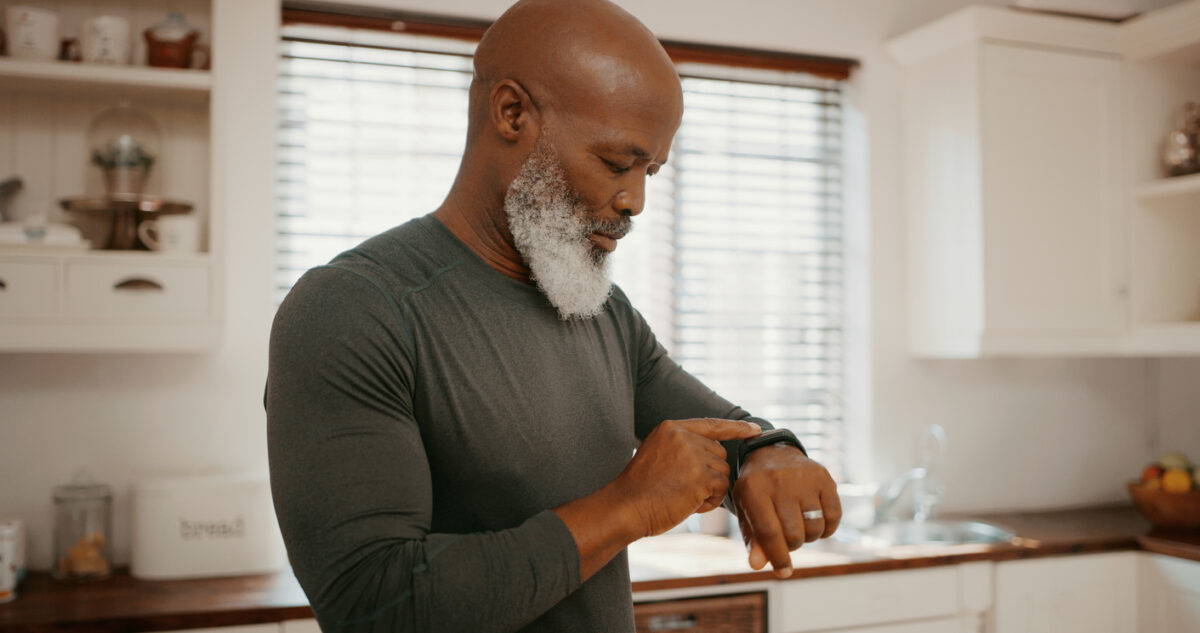 Image of person checking their wearable device